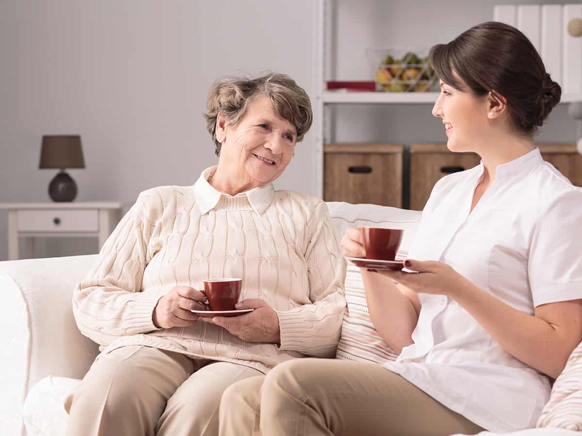 Image of a nurse talking to a woman