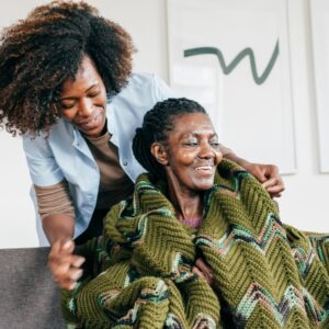 img of a woman caring for an older woman