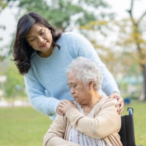 woman comforting older woman